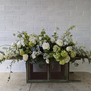 White casket flowers