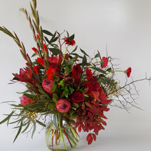 Load image into Gallery viewer, Bright vase design with gladioli, protea, gerbera and alstromeria
